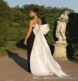 Seksowne sukienki wieczorne bez ramiączek białe i czarne wysokie rozdzielone podłogowe sukienki Formalne sukienki balowe z dużym łukiem5528943