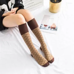 Calzini da donna in puro cotone lunghezza al ginocchio da donna stile college giapponese tubo lungo lettera stampata sport al polpaccio alla moda