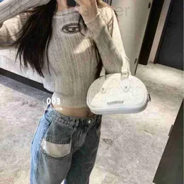 Women's Knits & Tees designer Autumn and Winter New Hot Spicy Girl Series Single Product Wool Blended Worn Hollow D-shaped Metal Emblem Knitwear for Women Y9XN