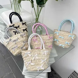 Japanese and Korean Bowtie Lafite Grass Woven Bag 2024 Spring Summer New Beach Vacation Handbag Water Bucket 240312