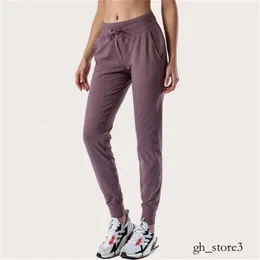 Lu Lu Lemen Ninth Women Yoga Pants Push Fitness Leggings Soft High midje höftlyft Elastiska avslappnade joggingbyxor 7 färger Luluemon Leggings Scubas Woman Half Zip 4