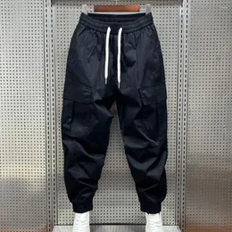 Calças masculinas grande capacidade de armazenamento calças confortáveis harém com cintura elástica vários bolsos para atividades ao ar livre macio