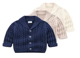 INS Baby Kids Clothing Seater Cardigan with Bottons Turn Down Collar Sweater Solid Color 100コットンブティックガール春秋SW1046728