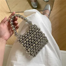 HBP icke-varumärke grossistmodedesign Sparkle Pearl Clutch Bag Mini Dinner Wedding Crossbody Bag Designer Hollowed Out Chain Tote Ladies 2024