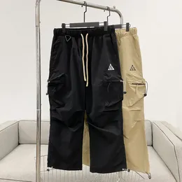 NK X ACG Logo Erkek Kadınlar Su Geçirmez Açık Mekan Şarj Tulumu Cep 3D Cut Casual Pantolon