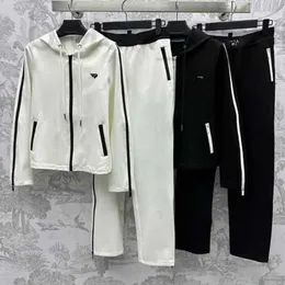 Designer de fatos de treino feminino início da primavera novo Nanyou Pra zíper contrastante cor com capuz jaqueta casual combinada com calças retas conjunto para mulheres QATR