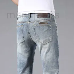 Herren-Jeans, Designer-Frühling/Sommer-Jeans, koreanische Ausgabe, kleiner Fuß, elastisch, schmale Passform, hochwertige europäische Marke, Leder-Label-Herrenhose, TLX6