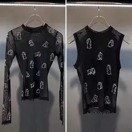 T-shirt da donna di design nuova di zecca nera trasparente in maglia di ferro trapano a maniche lunghe T-shirt base da donna