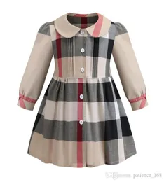 vestito scozzese dalle ragazze 2019 INS nuovi stili autunno ragazza bambini carino colletto bambola plaid stampato manica lunga bambini cotone di alta qualità Ple7799679