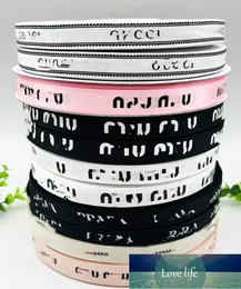 Mode große Marke Logo Schleife Schmuck DIY Gurtband Band Blumen Geschenkbox Verpackung Klebeband Schnürsenkel 1,0 cm