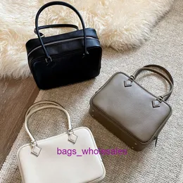 Bolsas projetadas para loja são vendidas baratas couro genuíno pena faixa de cabeça bolsa feminina bolsa leve mini travesseiro bolsa pequena