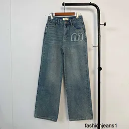 Jeans femininos Nanyou 24SS início da primavera novo modelo M Miao tecido minimalista com remendo lateral bordado cintura alta jeans de perna reta para mulheres 14C8