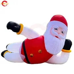 Atividades ao ar livre Boneco de neve deitado 10mL (33 pés) com soprador Decorações infláveis Temporada de Natal Decoração de quintal ao ar livre Modelo de desenho animado de boneco de neve inflável