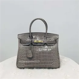 Kinbirk Womens Leisure 2024 Crocodile Axel Winter Bag Bags Handväskor Ko läderdesigner Straddle handhållen klassiska klassiska klassiska mode damer 5gktnm3 väskor k4a7