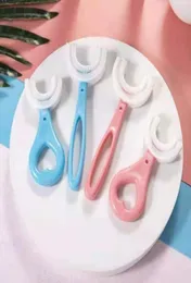 Bebê crianças mordedores escovas de cuidados de saúde ushape 360 graus silicone macio mão limpeza oral dente para menino menina idade 212t3358892