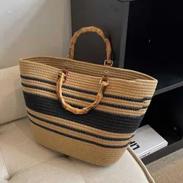 Borse da spiaggia Borsa tessuta in filo di cotone Borsa con manico in nodo di bambù di grande capacità Borsa a strisce semplificata in erba versatile da spiaggia