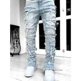 Jeans da uomo 2023 Cool Distressed Strappato Slim Fit Pantaloni in denim elasticizzato Stile streetwear Abiti di moda 310