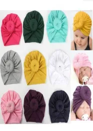 Cappello per neonato Cappello indiano con ciambella a spirale per cappelli berretti Maternità 2018 Autunno Primavera 12 colori Esportati1619776