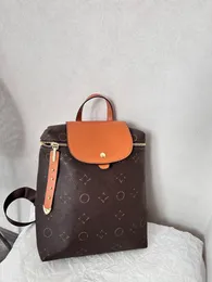 24ss feminino designer de luxo mochila sacola de compras de couro bolsa feminina bolsa de ombro saco de livro upscale mochila ao ar livre 28cmcm