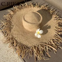 Naturalny Rafia Straw Hat Summer Women Duże szerokie grzbiet ochrony przeciwsłoneczne Haty Lady Gilrs Holiday Panama Beach 240309