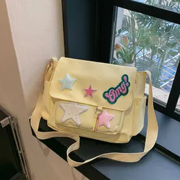 النسخة الكورية Instagram Trendy Student Transoring حقيبة كتف محمولة ، حقيبة قماش ، حقيبة Crossbody للسيدات ، حقيبة كبيرة حملها 240315