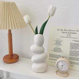 Vasen, Kunstskulptur, Eiervase, Kieselstein, Blumenarrangement, Heimdekoration aus Keramik