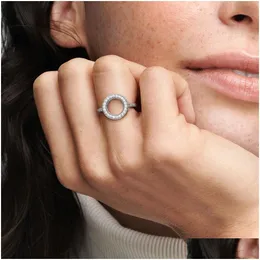 Bröllopsringar Nytt varumärke 100% 925 Sterling Sier Rose Gold Sparkling Halo Ring med kubiska zirkoniumstenar för kvinnor Bröllopsringar Fashi Dhzyt