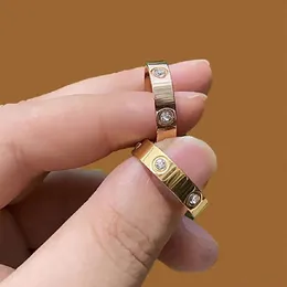 Simple chic luxury ring gold plated love ring gold and silver rose color stainless steel couple ring fashion design women and men wholesale Formal Events