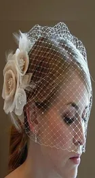 بيع العروس حجاب المشط Blusher Birdcage Tulle Ivory Champagne Flowers Feather Feather Bridal Wedder S Hat Dress7124439