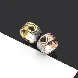 Anel de chapeamento de ouro 18k de aço de titânio oco letra f dois tons anéis femininos casal esmalte cor masculino designer joias BR-07