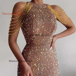 Designerklänningar 2024 Spring/Summer New Fashion Hanging Neck Sexy Crystal Tassel Wrap Hip Sequin European and American Dress Mid midje Evening Dress