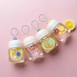 Bottiglie d'acqua in vetro carino per bambini ragazze coperchio pisello impugnatura Mini 320ML tazza da tè senza piombo bottiglia per bevande portatile EDC regalo di Natale