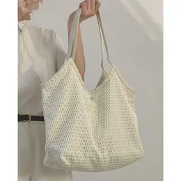 Hip omuz çantaları dokuma çanta kadın tasarımcı çanta modaya uygun tote çok yönlü öğrenci sınıfı büyük kapasite çanta 240311
