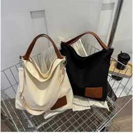 Hip Shoulder Bags Canvas Bag for Women with Large Capacity and Niche Design Trendy Texture Handbag Commuting College Students Class Diagonal Crossing Trend 240311
