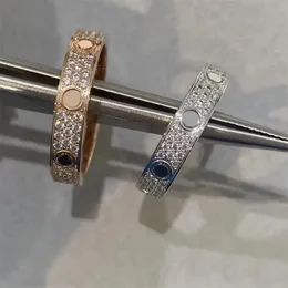 Ring designer kvinnor kärlek ring herr designer hjärtring par smycken titanium stål ring mode klassisk guld och silver rose diamant skruv flera storlekar val