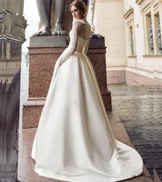 Modest Long Sleeve Wedding Dress 2020 New Scoop Satin Appliqued Aline Bridal Gown with Pockets Vestidos de Novia 132729883