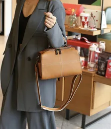 Borsa Boston in pelle con motivo a croce stagionale del marchio di moda DMD con la nostra qualità di fabbrica