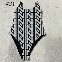 Vadderade kvinnor simmar bodysuit sportiga underkläder lyxdesigner en bit baddräkt sexig push up baddräkter låg rygg badkläder