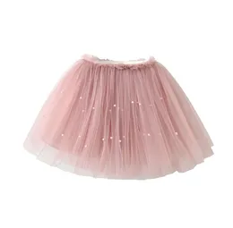 Kjolar baby flickor tutu kjolar pärla kort tårta småbarn flicka kjol barn bow prinsessan vågig rosa puffy tyll kjolar balett barn 230510 zz