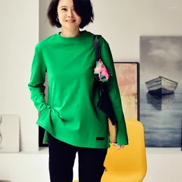 女性用TシャツMicoco T9651Cソリッドカラーサイドスリットルーズラウンドネック長袖ベースTシャツ女性スプリングレジャーシンプルで汎用性