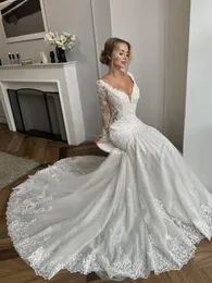 Abito da sposa a sirena con scollo a V trasparente di bellezza maniche lunghe che borda applicazioni di bling pizzo corte strascico abiti da sposa tromba nuovo arrivo