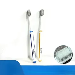 Tandborste litet huvud tandborste mjukt hår partiellt medelhår vuxen familjstil spiraltråd par män och kvinnor