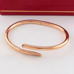 Stile classico Solo un braccialetto per unghie bracciale rigido di design gioielli in oro rosa tendenza stravagante colore invariabile bracciali da donna in acciaio al titanio di alta qualità