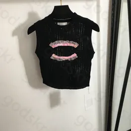 メッシュスパンコールニットキャミソール女性セクシーなノースリーブの刺繍中空ニットベストスタイリッシュなホルタートップス