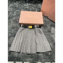 muimui womens designer mui mui clothing mius mius render 23 Autumn/winter New British Jk Style Short Pleated Half Skirt Womens Metal Buckle Belt Fashion Versatile