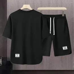 Herrspårar män sportkläder set sommar avslappnad outfit o-hals kort hylsa t-shirt elastisk dragkamp midja bred ben shorts