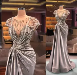 2022 Arabskie seksowne luksusowe sukienki na studniówkę klejnotną szyję iluzja rękawy kryształowe cekiny Bling Formalne sukienka imprezowa Suknia wieczorna 4307632