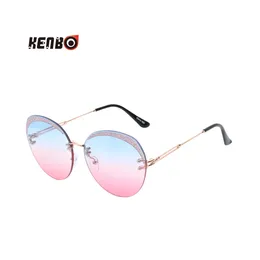 Óculos de sol Kenbo luxo redondo gradiente mulheres metal curvado faísca decoração óculos sem aro moda óculos de sol senhoras uv400