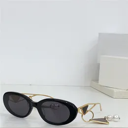 Ny modedesign Små ovala solglasögon 62ws acetatram metalltempel Enkel och populär stil utomhus UV400 skyddsglasögon med utsökt hänge