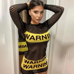 Abiti casual scava fuori lettere di personalità di avvertimento stampate abito sexy trasparente a maniche lunghe per le donne